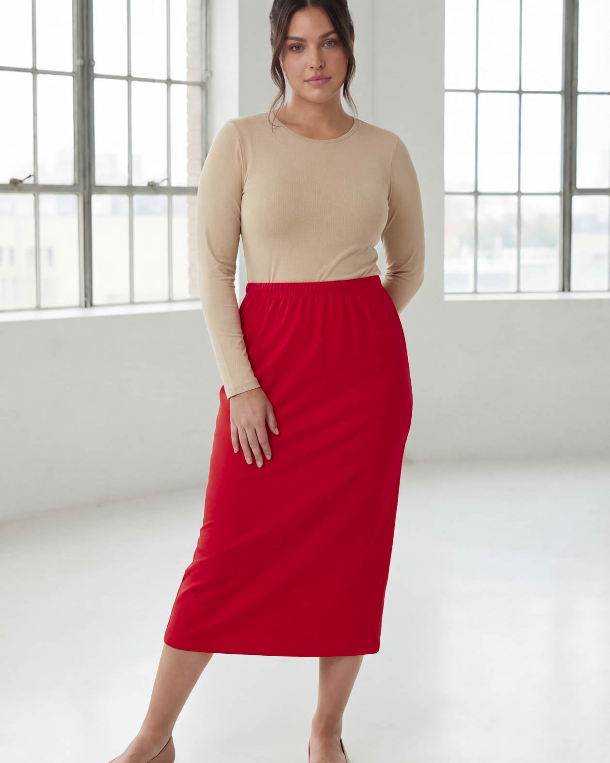 Model wearing Nuggles® 31" Classic Skirt in Red