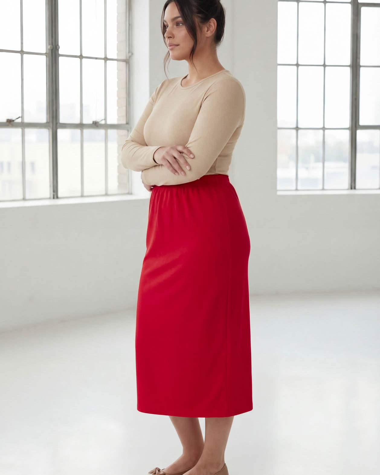 Model wearing Nuggles® 31" Classic Skirt in Red