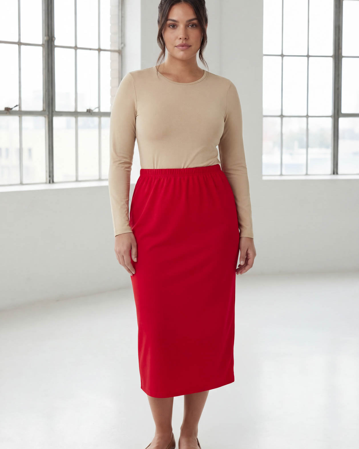 Model wearing Nuggles® 31" Classic Skirt in Red