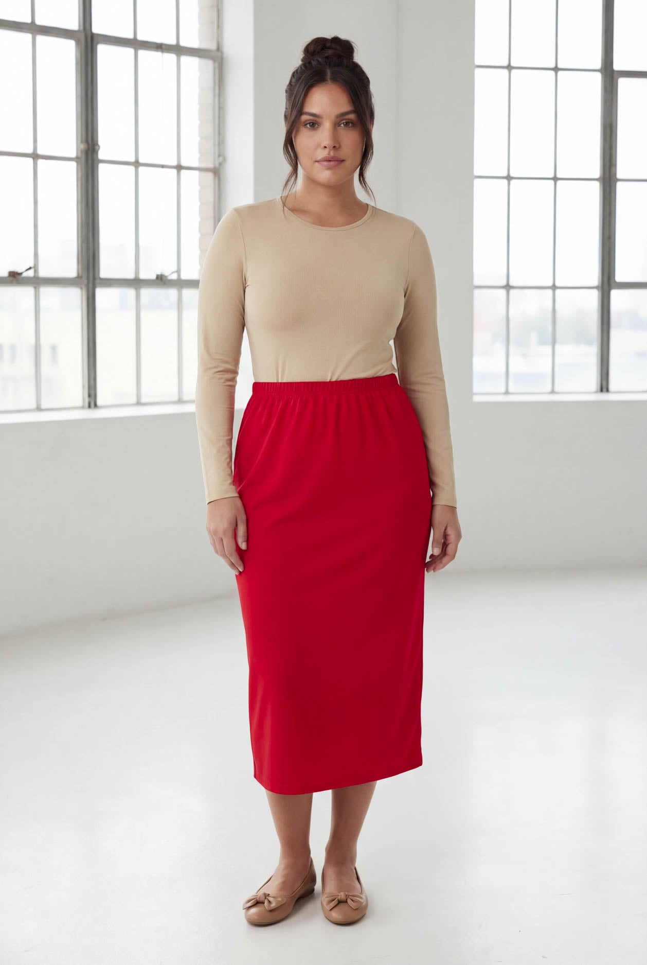 Model wearing Nuggles® 31" Classic Skirt in Red