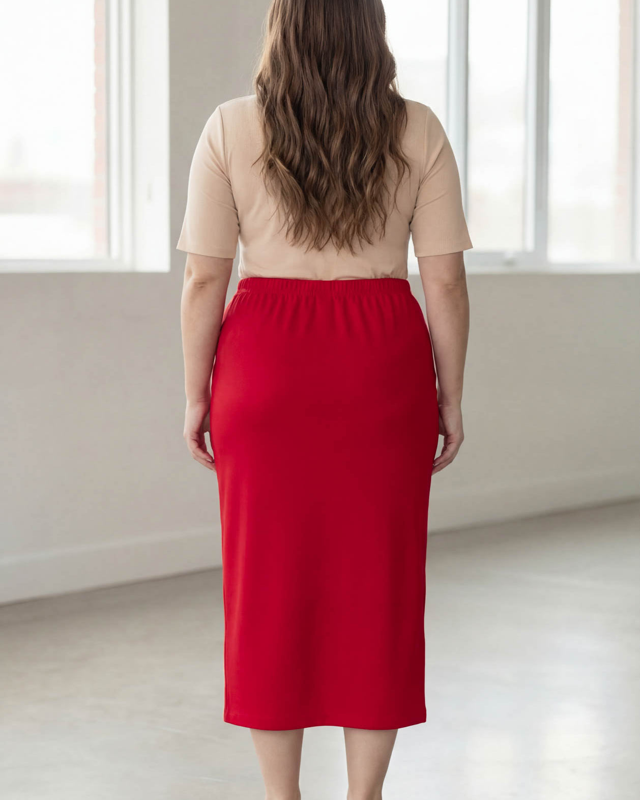 Model wearing Nuggles® 34" Classic Skirt in Red