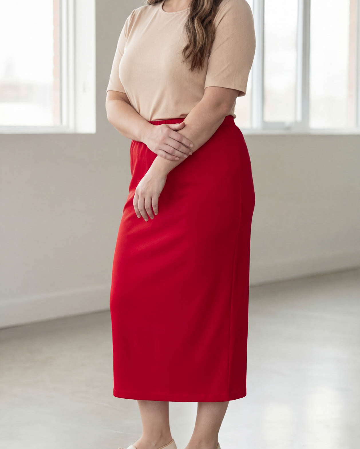 Model wearing Nuggles® 34" Classic Skirt in Red