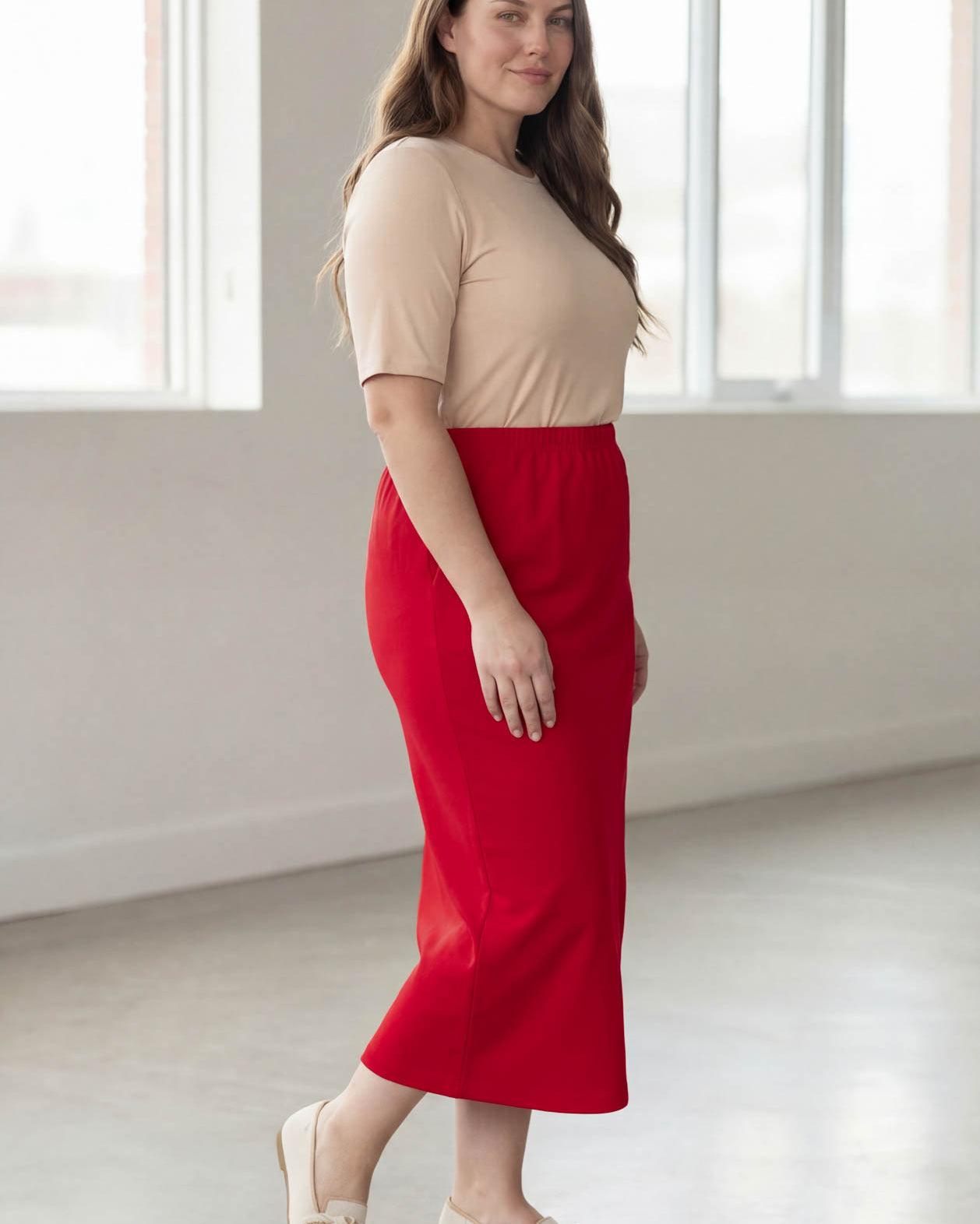 Model wearing Nuggles® 34" Classic Skirt in Red