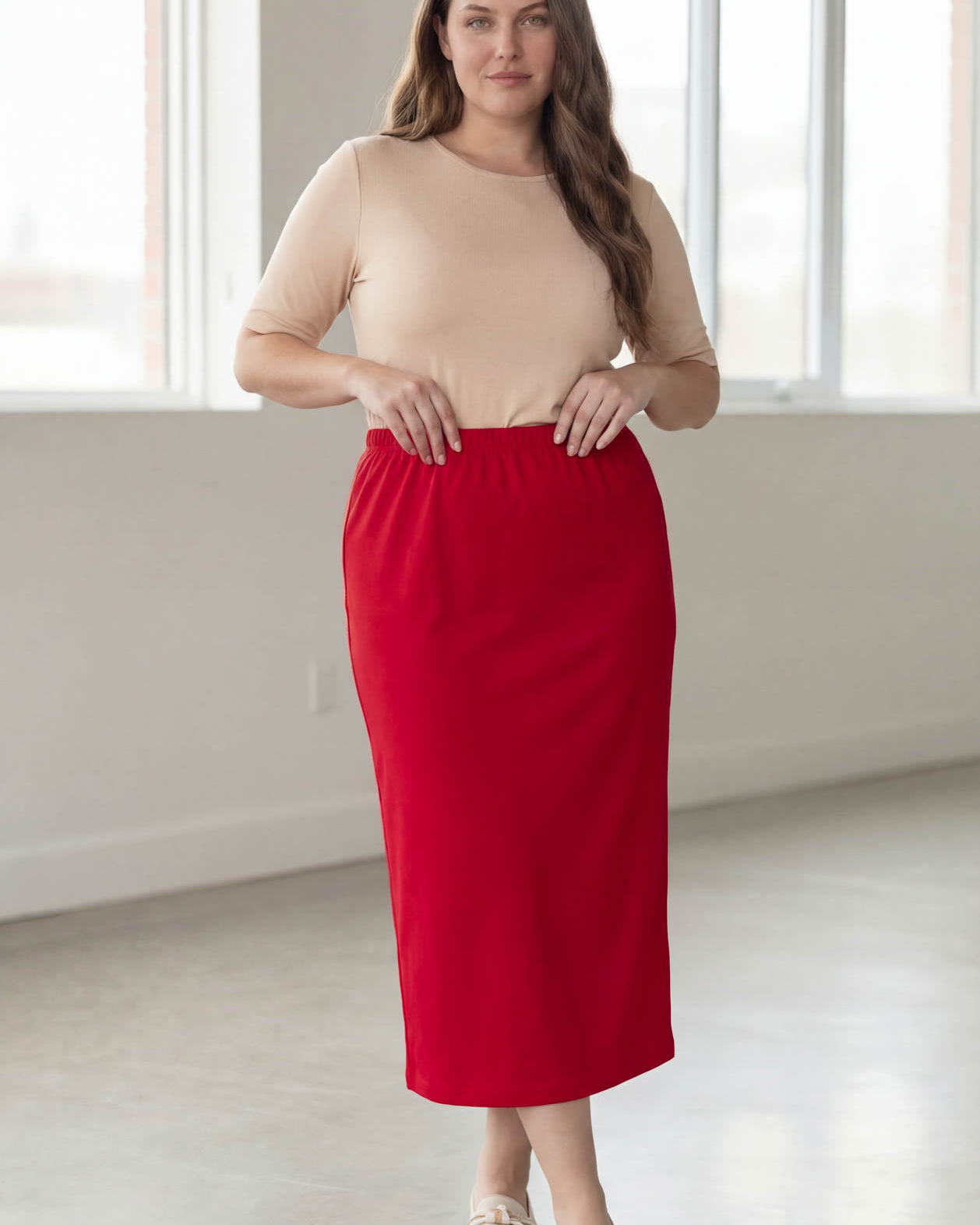 Model wearing Nuggles® 34" Classic Skirt in Red