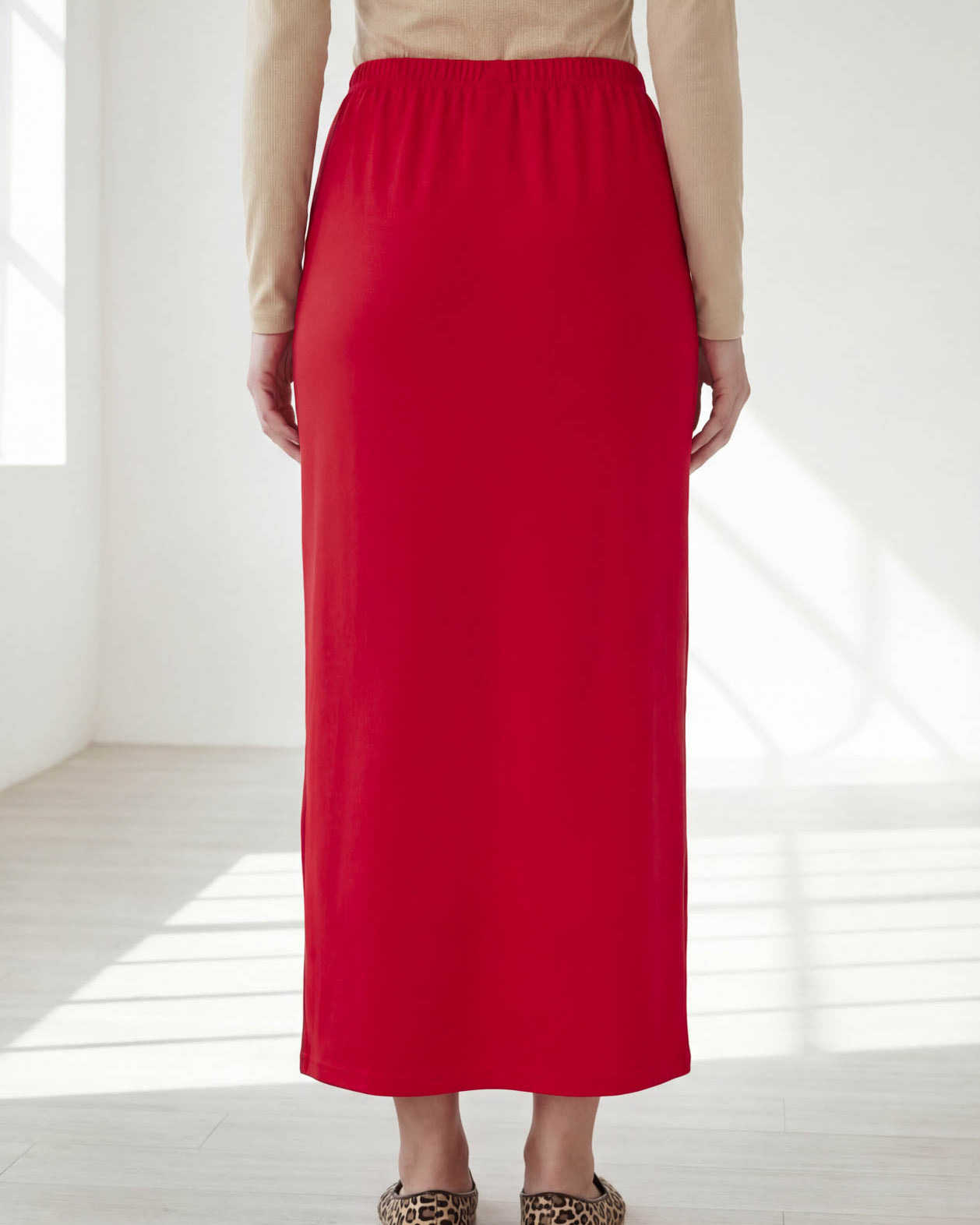 Model wearing Nuggles® 36" Classic Skirt in Red