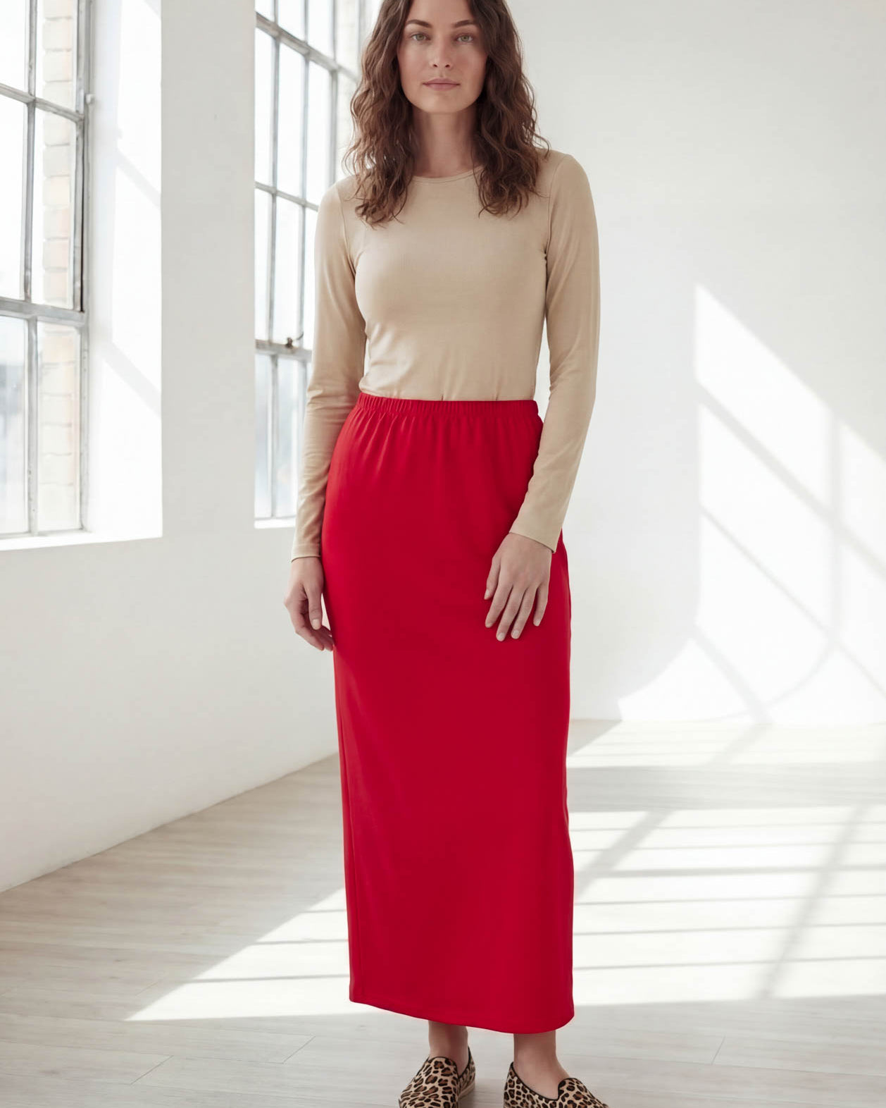 Model wearing Nuggles® 36" Classic Skirt in Red