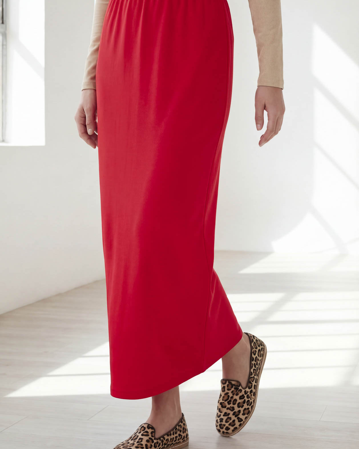Model wearing Nuggles® 36" Classic Skirt in Red