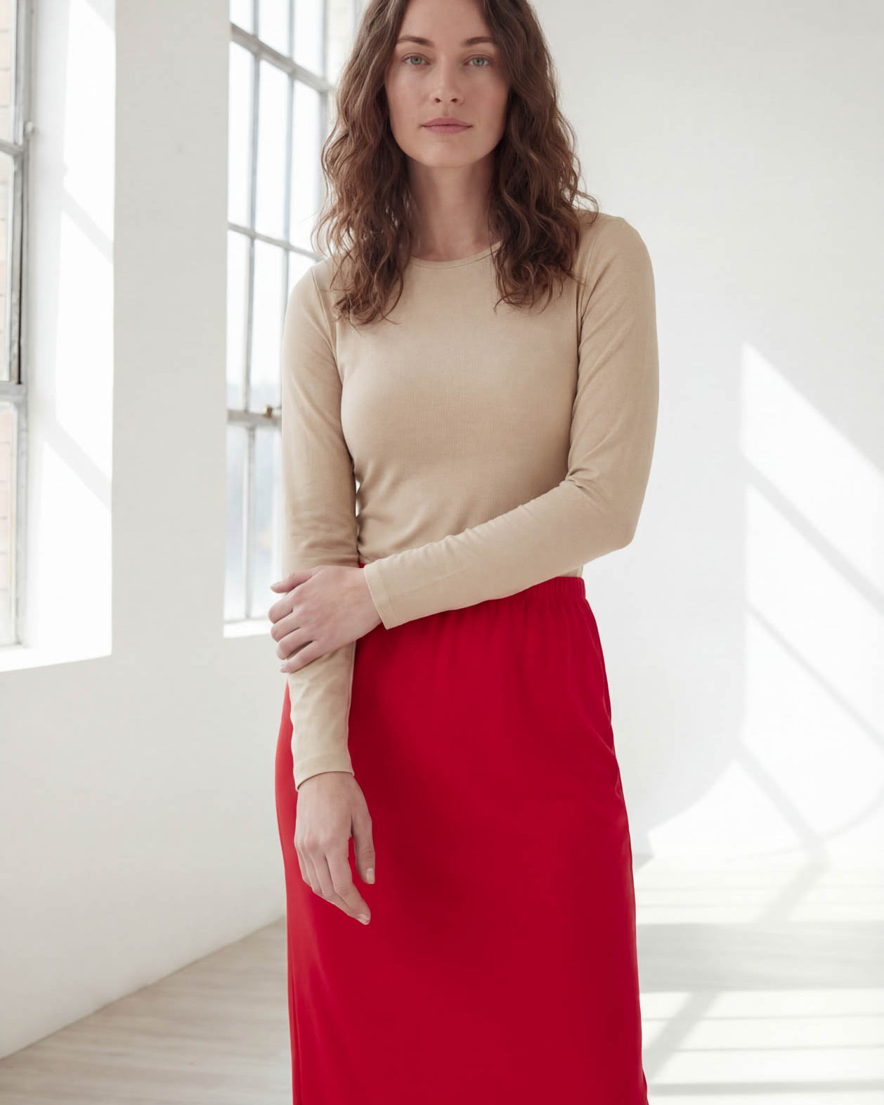 Model wearing Nuggles® 36" Classic Skirt in Red