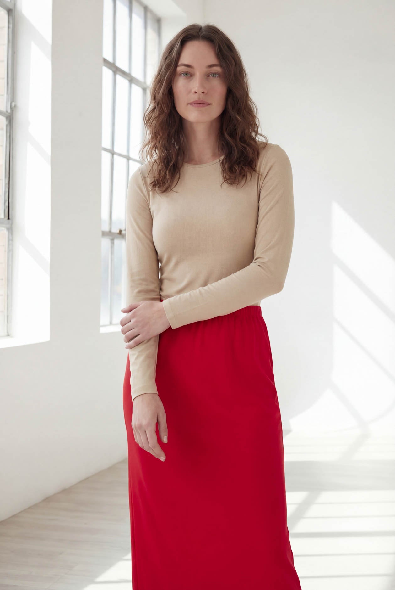 Model wearing Nuggles® 36" Classic Skirt in Red