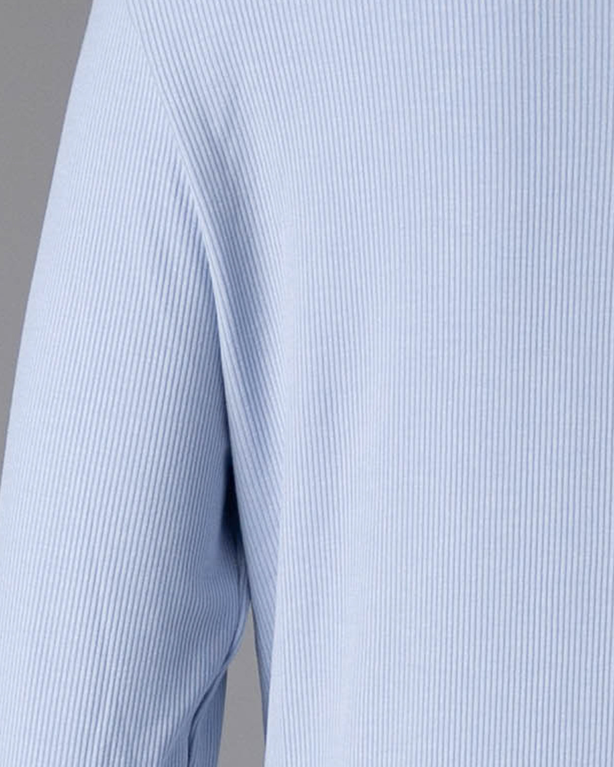 Model wearing Nuggles® Ribbed Midi Layering Dress in Soft Blue