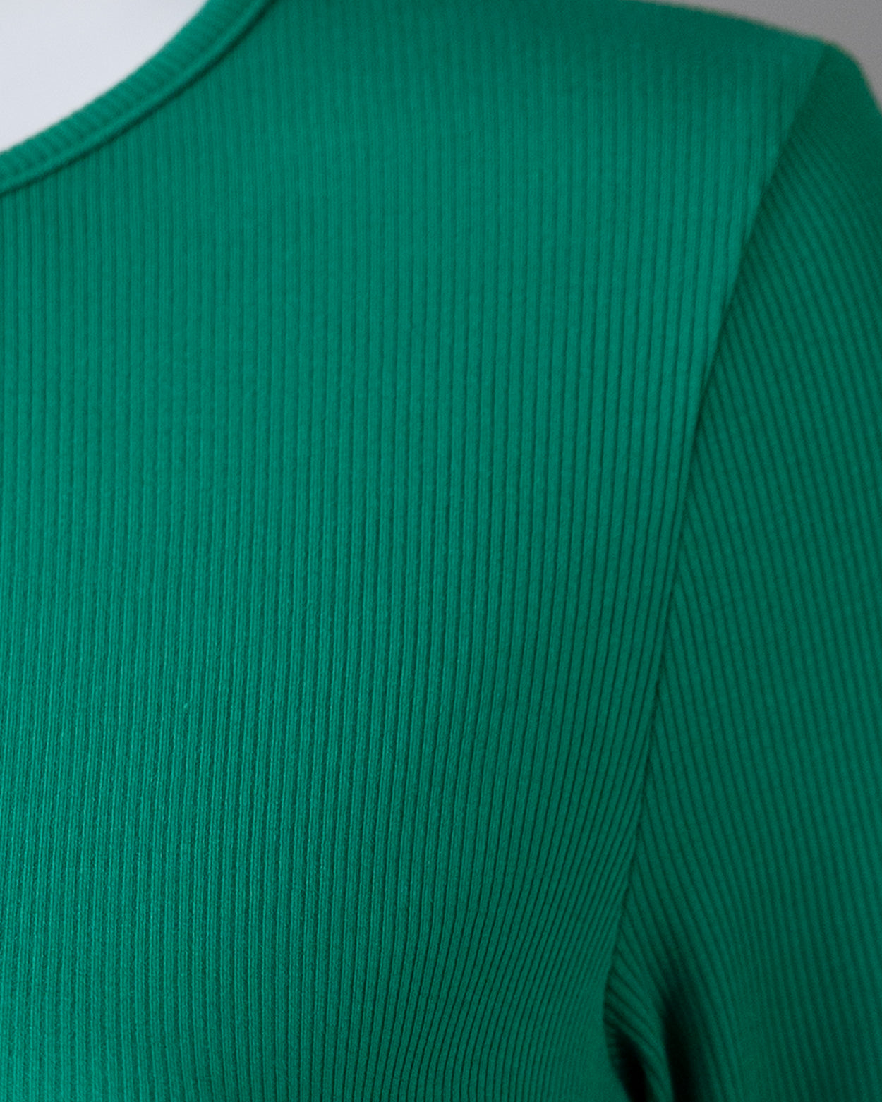 Model wearing Nuggles® 3/4 Essential Ribbed Tee in Kelly Green