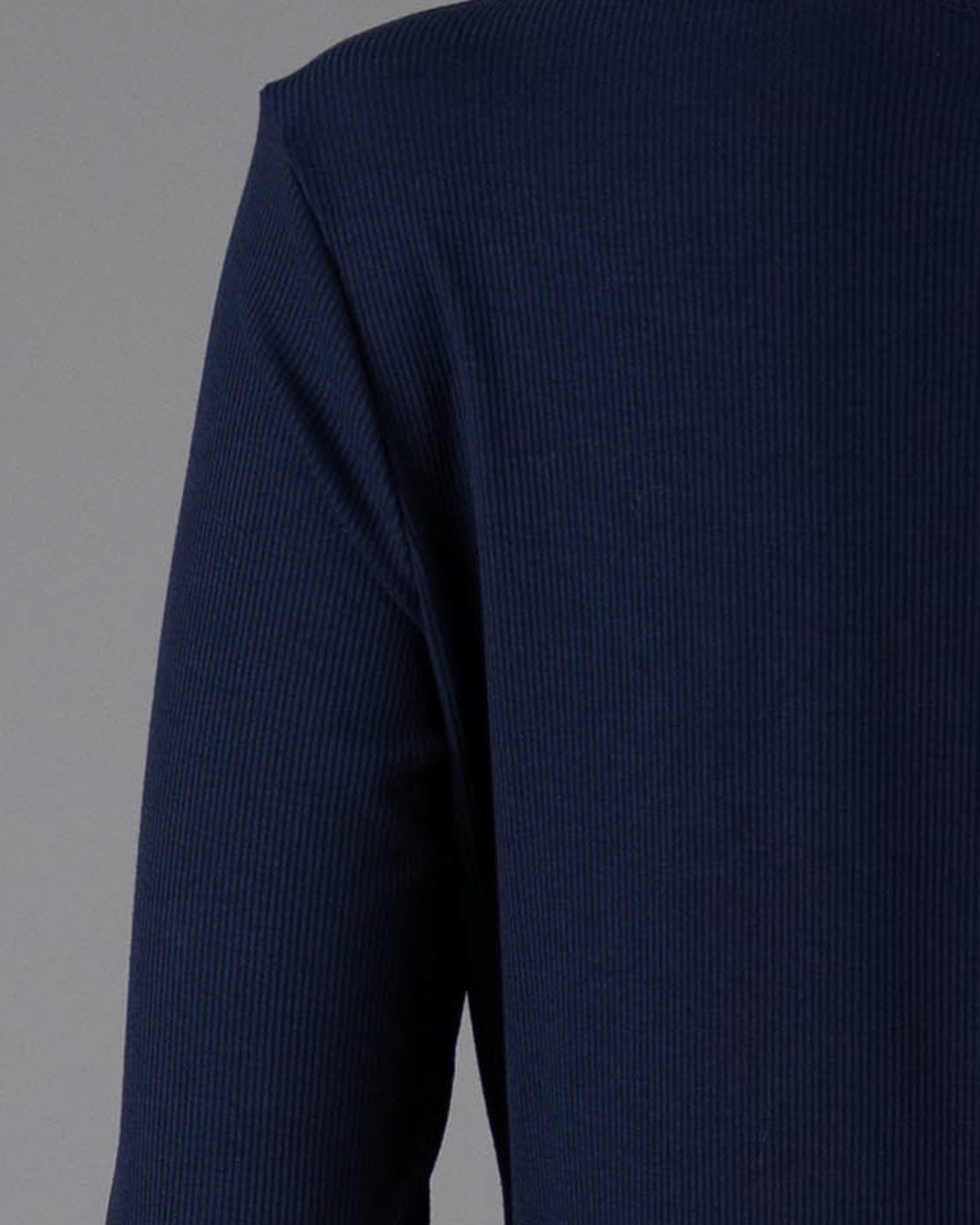 Model wearing Nuggles® 3/4 Essential Ribbed Tee in Navy