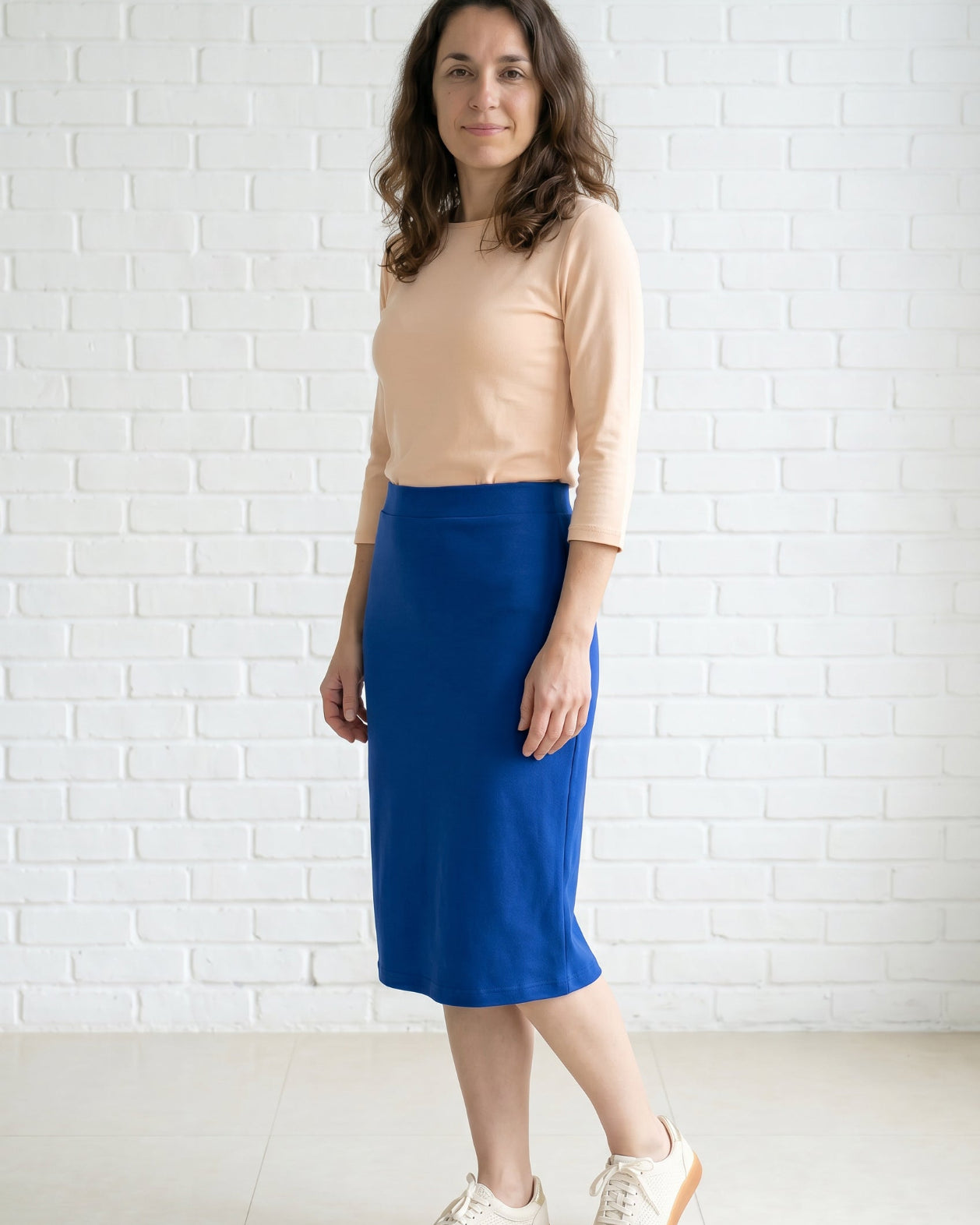 Model wearing Nuggles® 27" Relaxed Skirt in Royal Blue