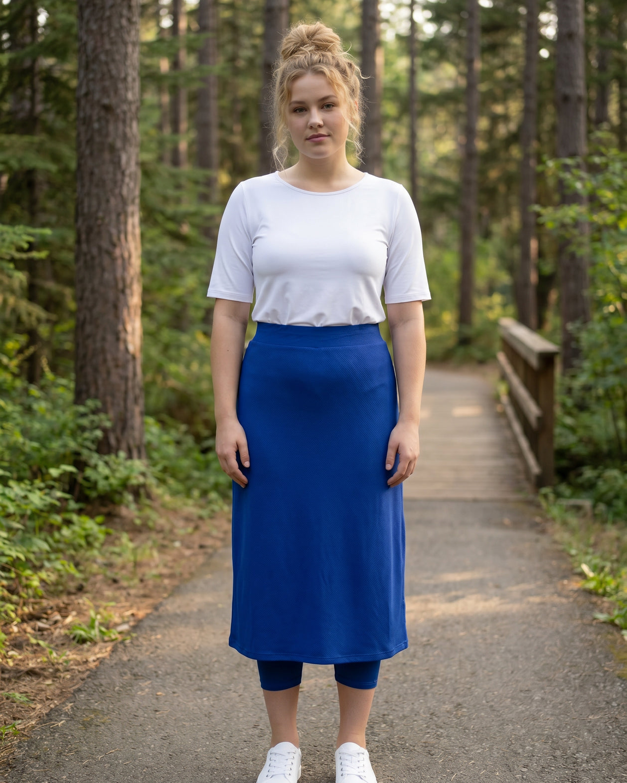 Model wearing Nuggles® 31" All-Sport Skirt in Royal Blue