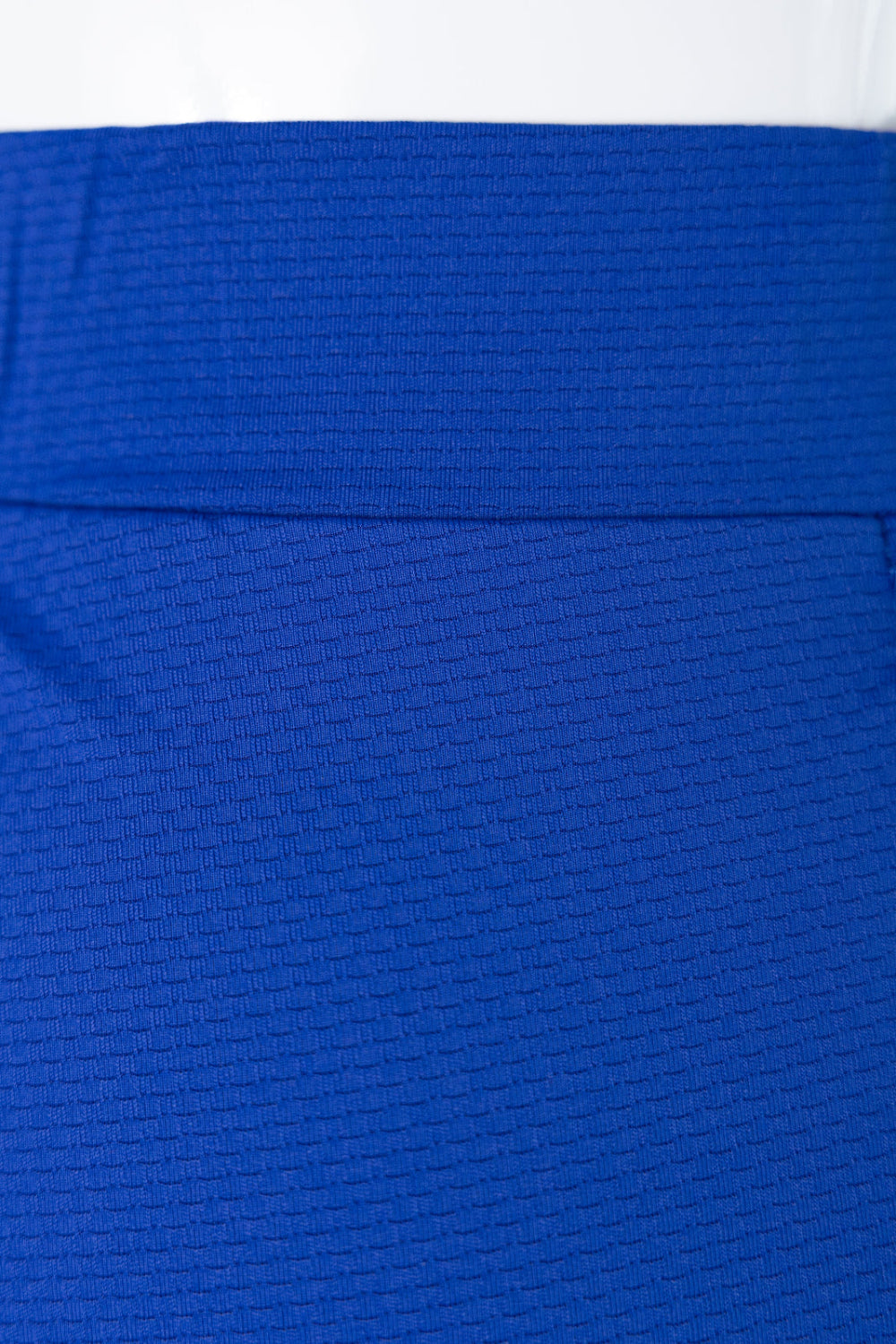 Model wearing Nuggles® 31" All-Sport Skirt in Royal Blue