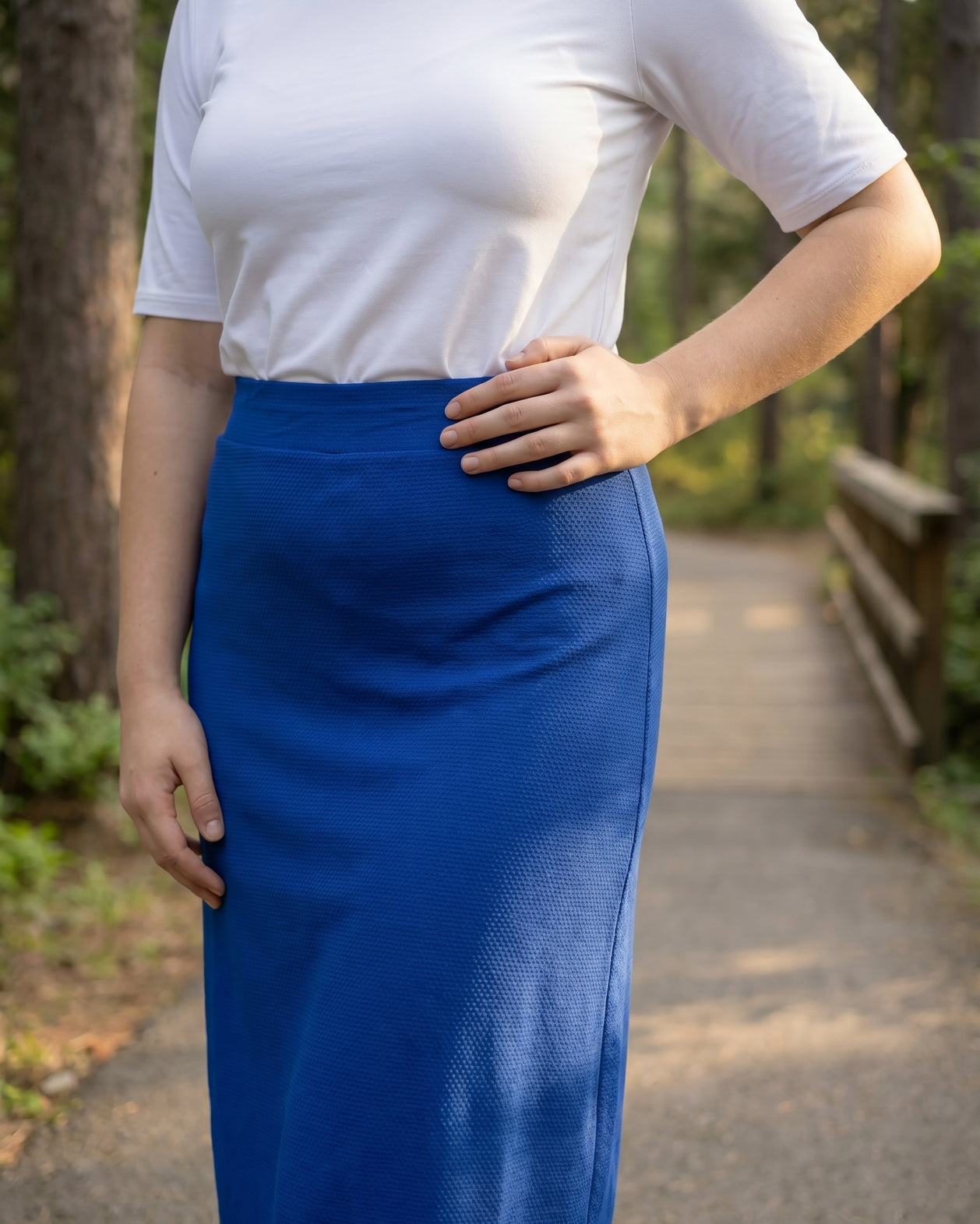Model wearing Nuggles® 31" All-Sport Skirt in Royal Blue