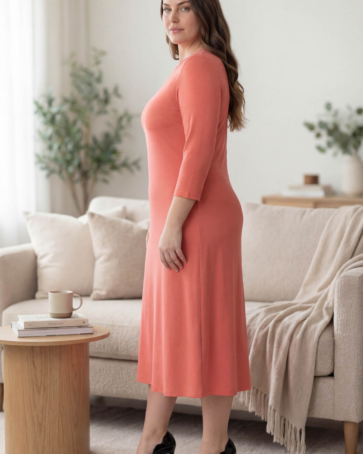 Model wearing Nuggles® Midi Layering Dress in Salmon
