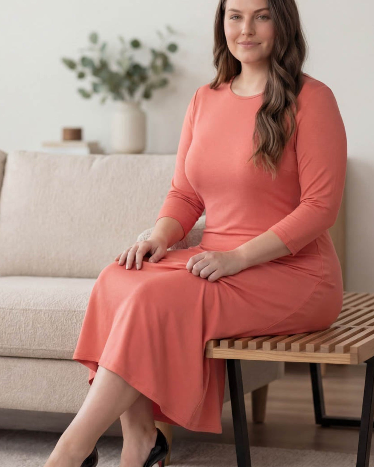 Model wearing Nuggles® Midi Layering Dress in Salmon