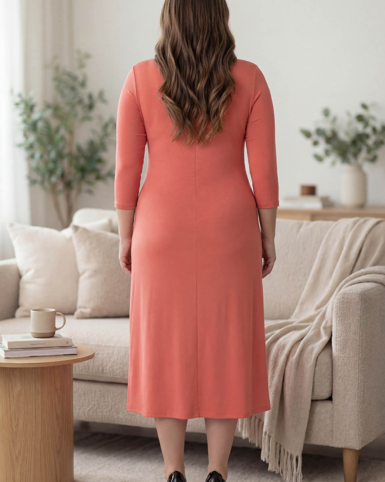 Model wearing Nuggles® Midi Layering Dress in Salmon