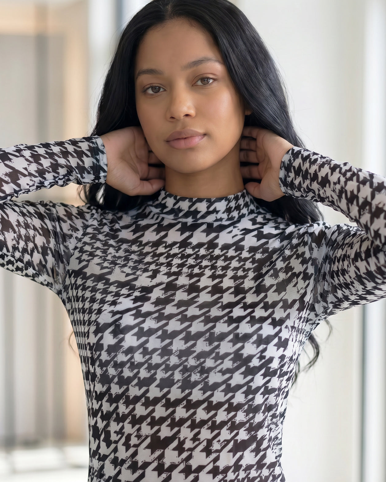 Model wearing Nuggles® Mesh Tee in Sharp Classic
