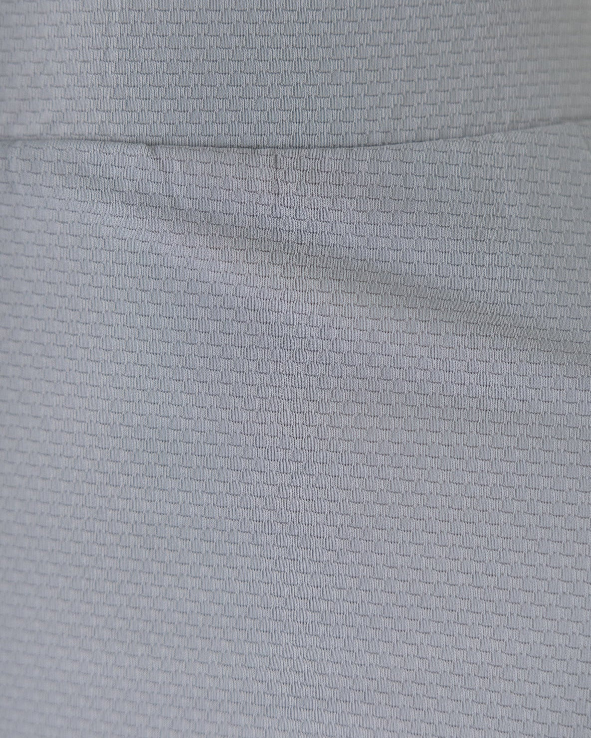 Close Up Detail Shot of Silver Sport Fabric