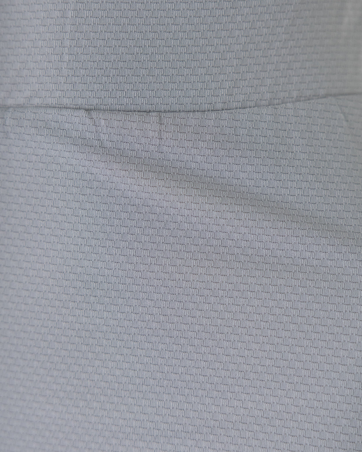 Close Up Detail Shot of Silver Sport Fabric