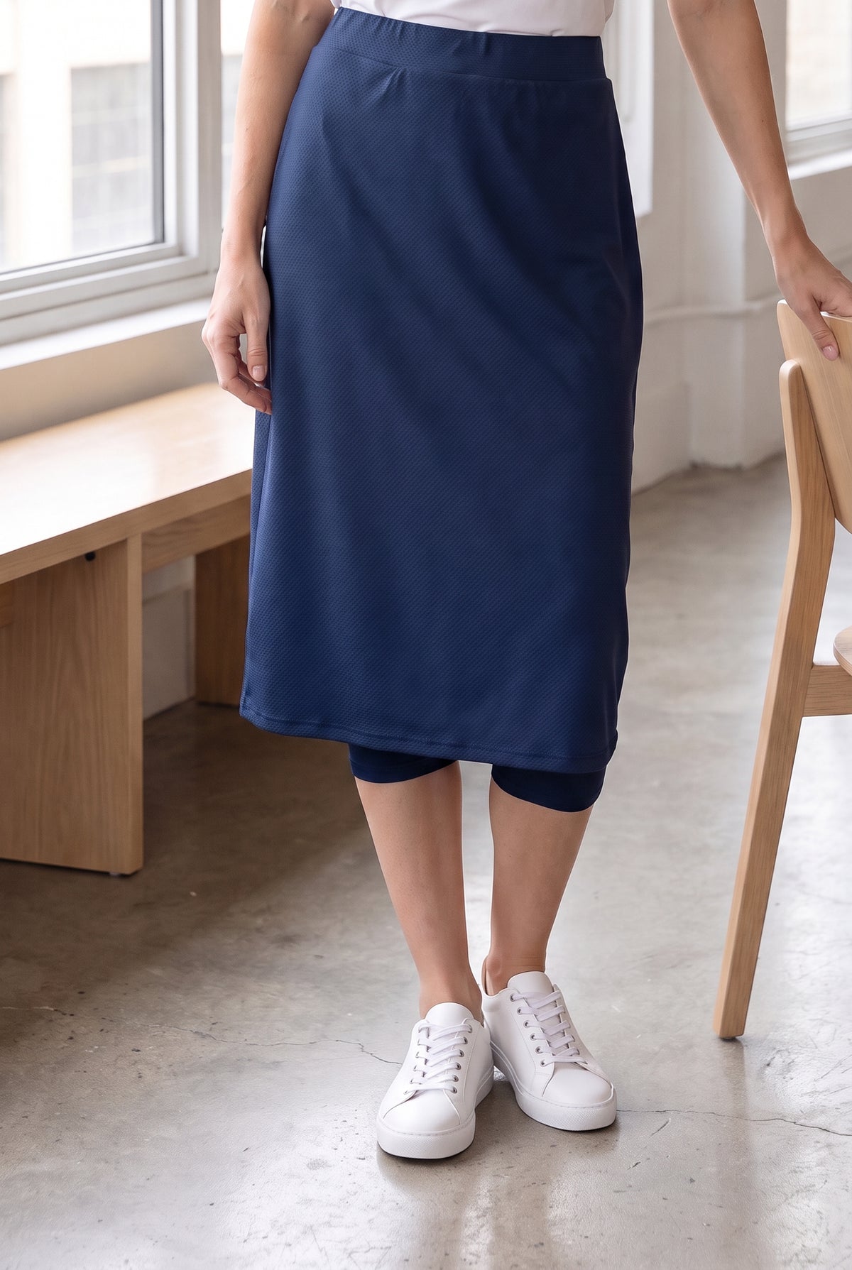 Model wearing Nuggles® 27" Sport Skirt in Slate Blue