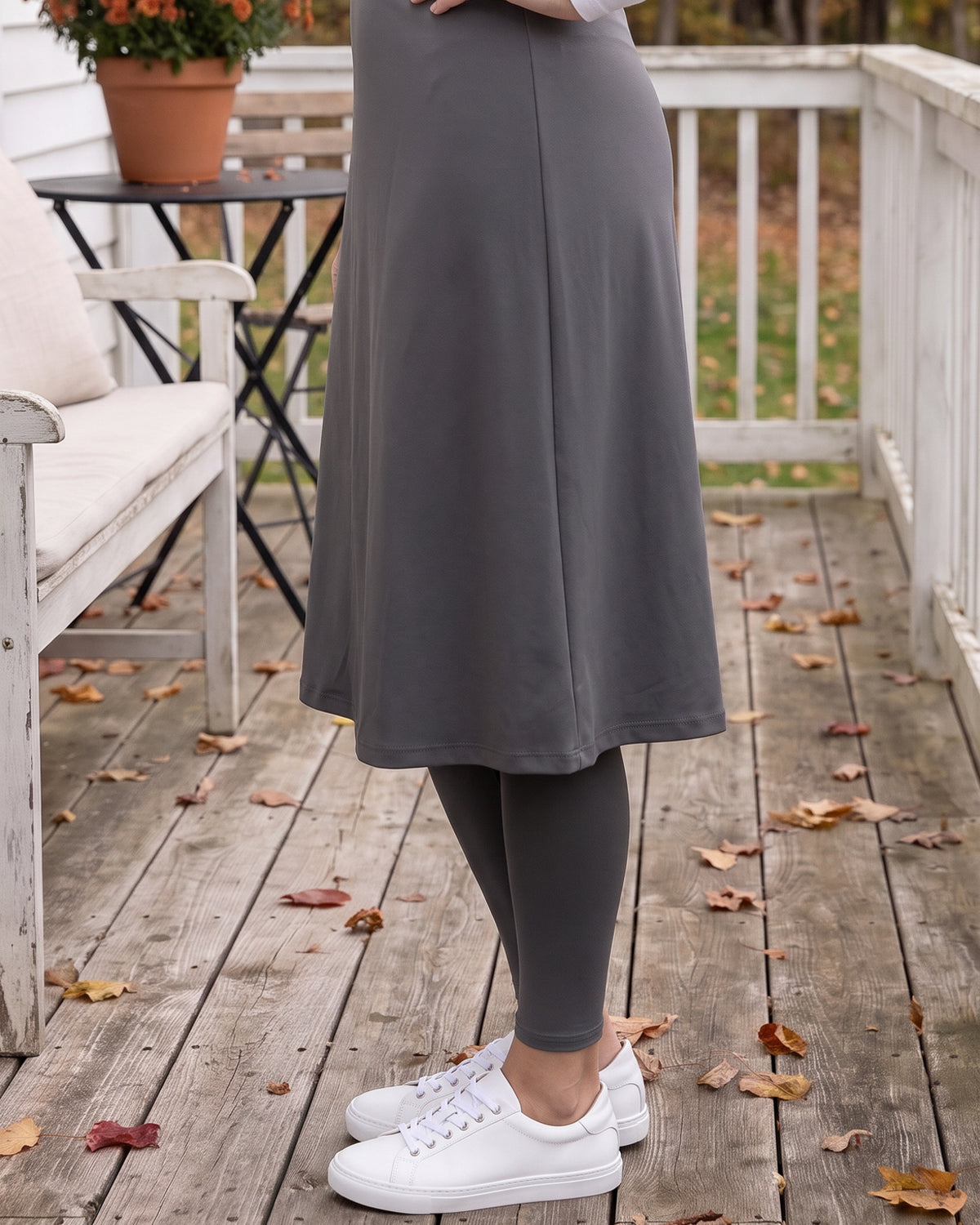 Model wearing Nuggles® Tilly Sport Skirt in Slate Grey