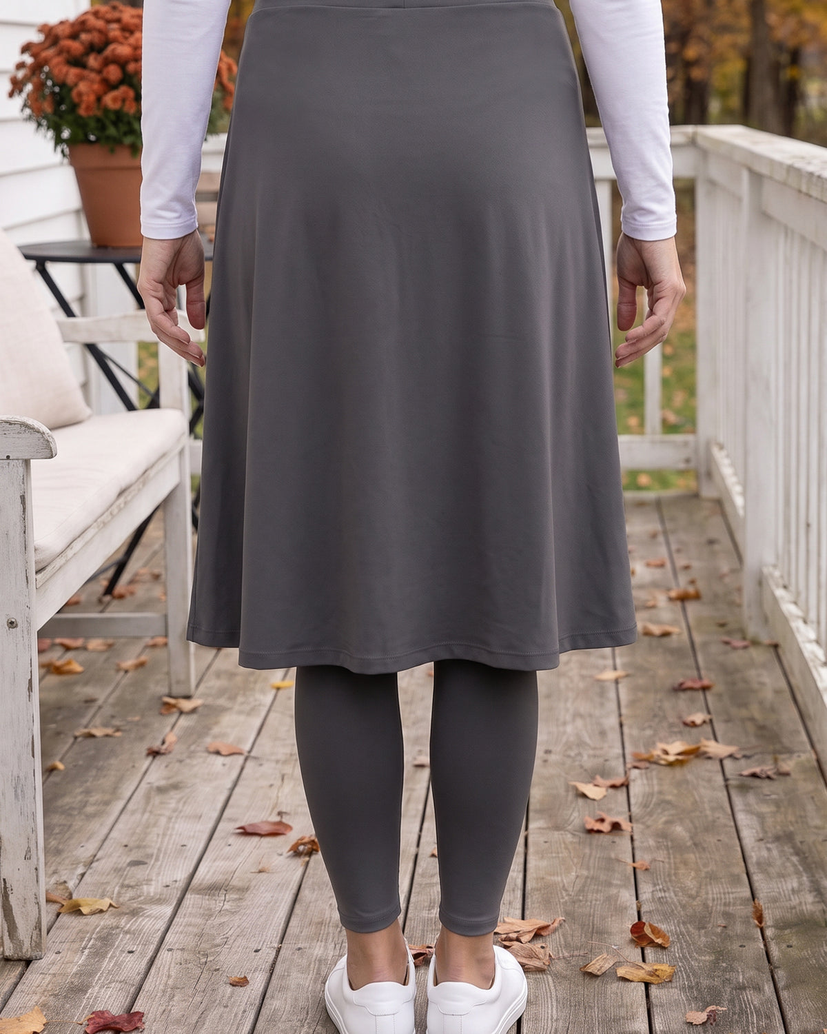Model wearing Nuggles® Tilly Sport Skirt in Slate Grey