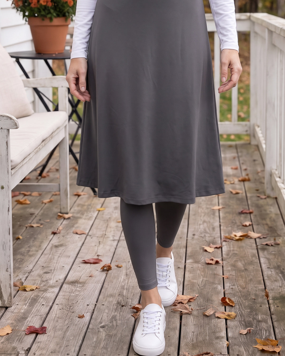 Model wearing Nuggles® Tilly Sport Skirt in Slate Grey