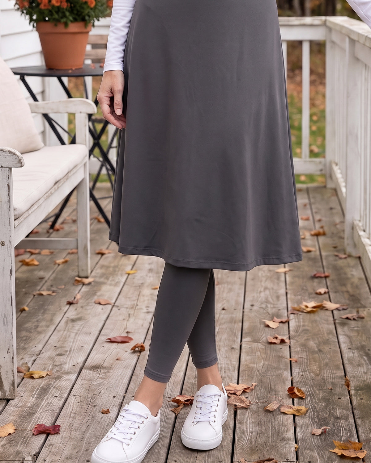 Model wearing Nuggles® Tilly Sport Skirt in Slate Grey