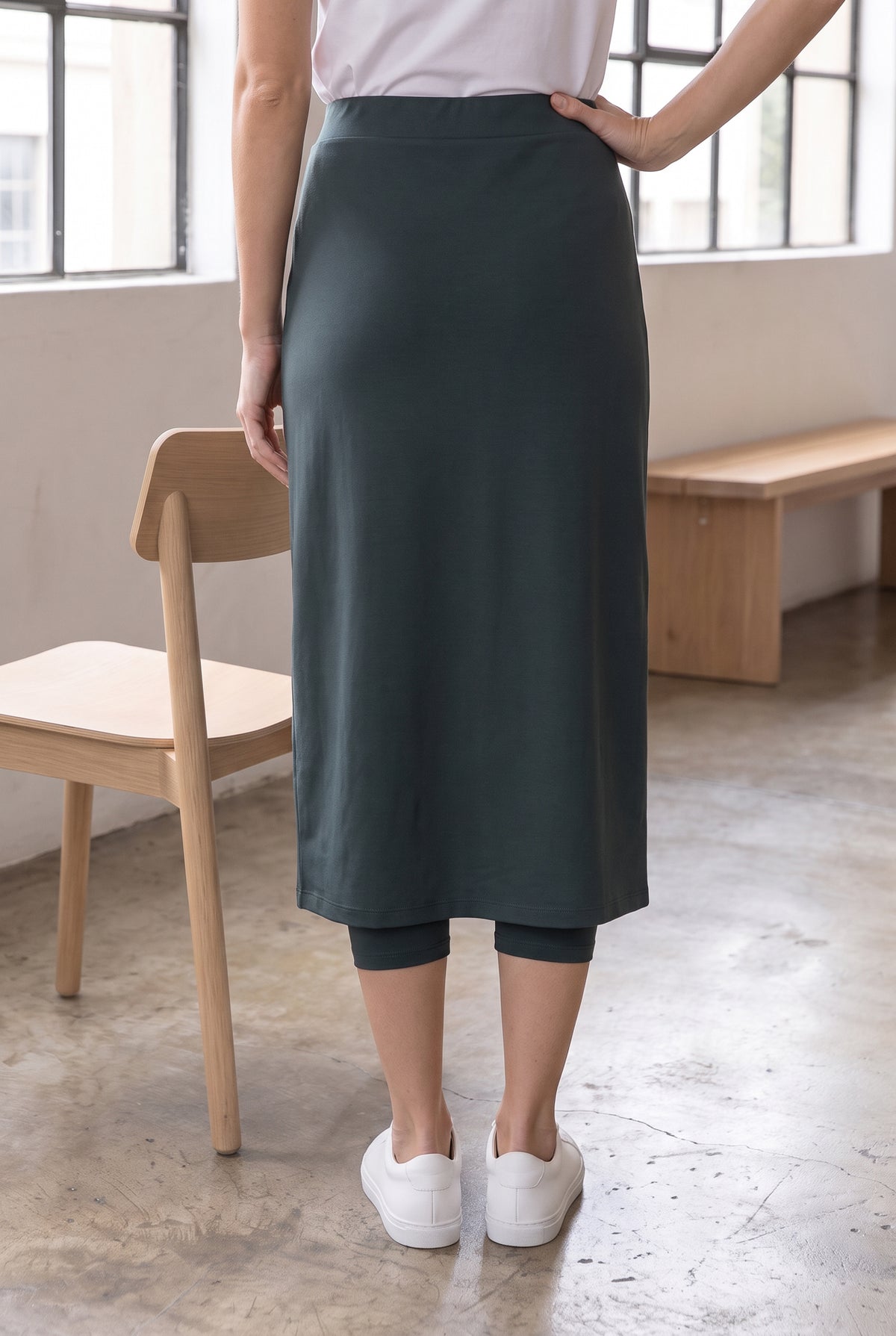 Model wearing Nuggles® 31" Sport Skirt in Smokey Green