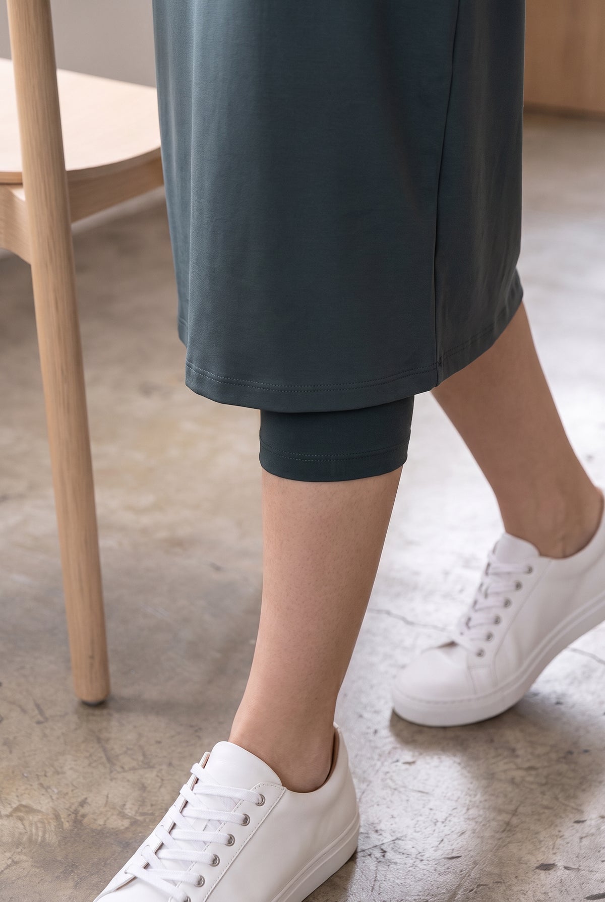 Model wearing Nuggles® 31" Sport Skirt in Smokey Green