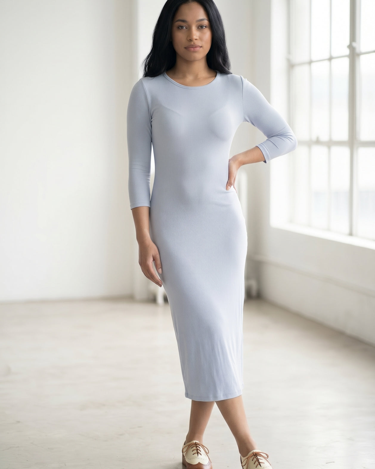 Model wearing Nuggles® Ribbed Midi Layering Dress in Soft Blue