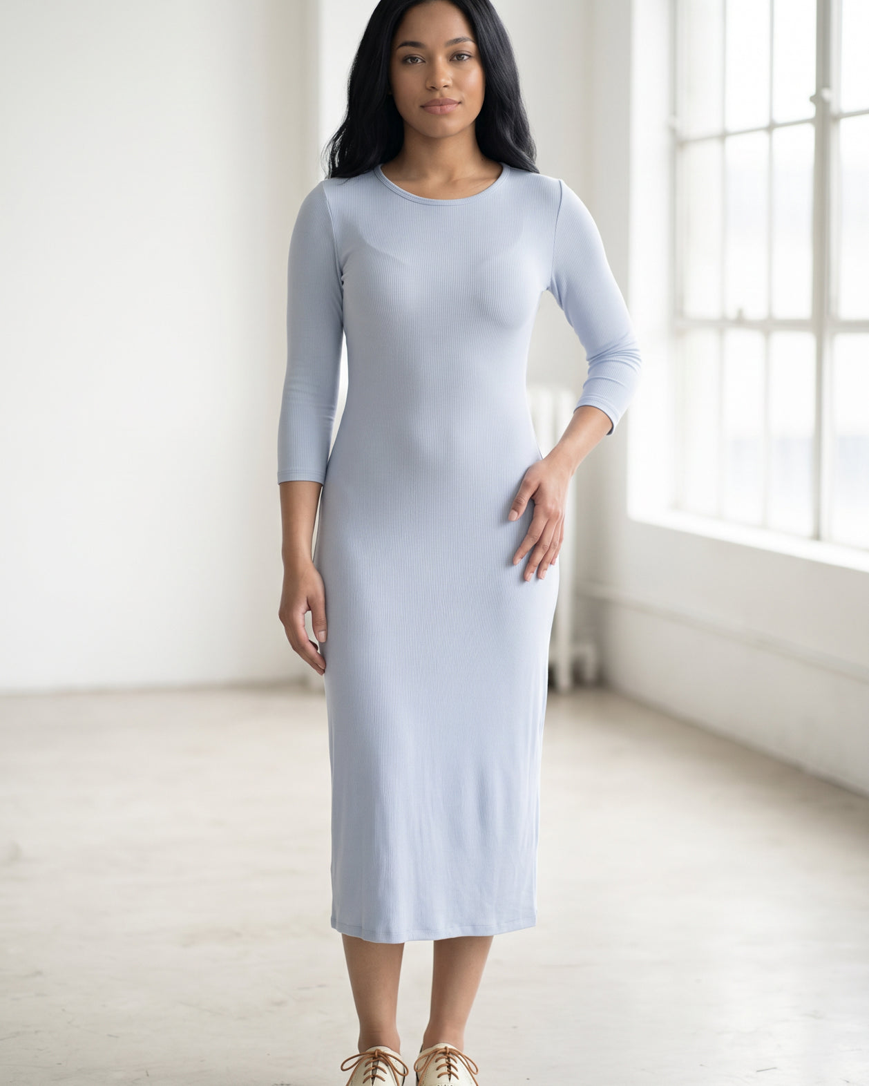 Model wearing Nuggles® Ribbed Midi Layering Dress in Soft Blue