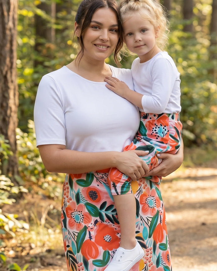 Model wearing Nuggles® Girls All-Sport Skirt in Summer Tropic