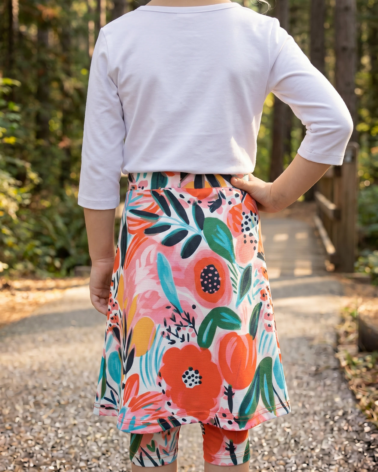 Model wearing Nuggles® Girls All-Sport Skirt in Summer Tropic