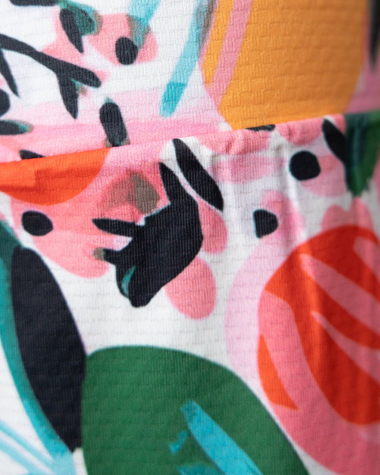 Model wearing Nuggles® Girls All-Sport Skirt in Summer Tropic