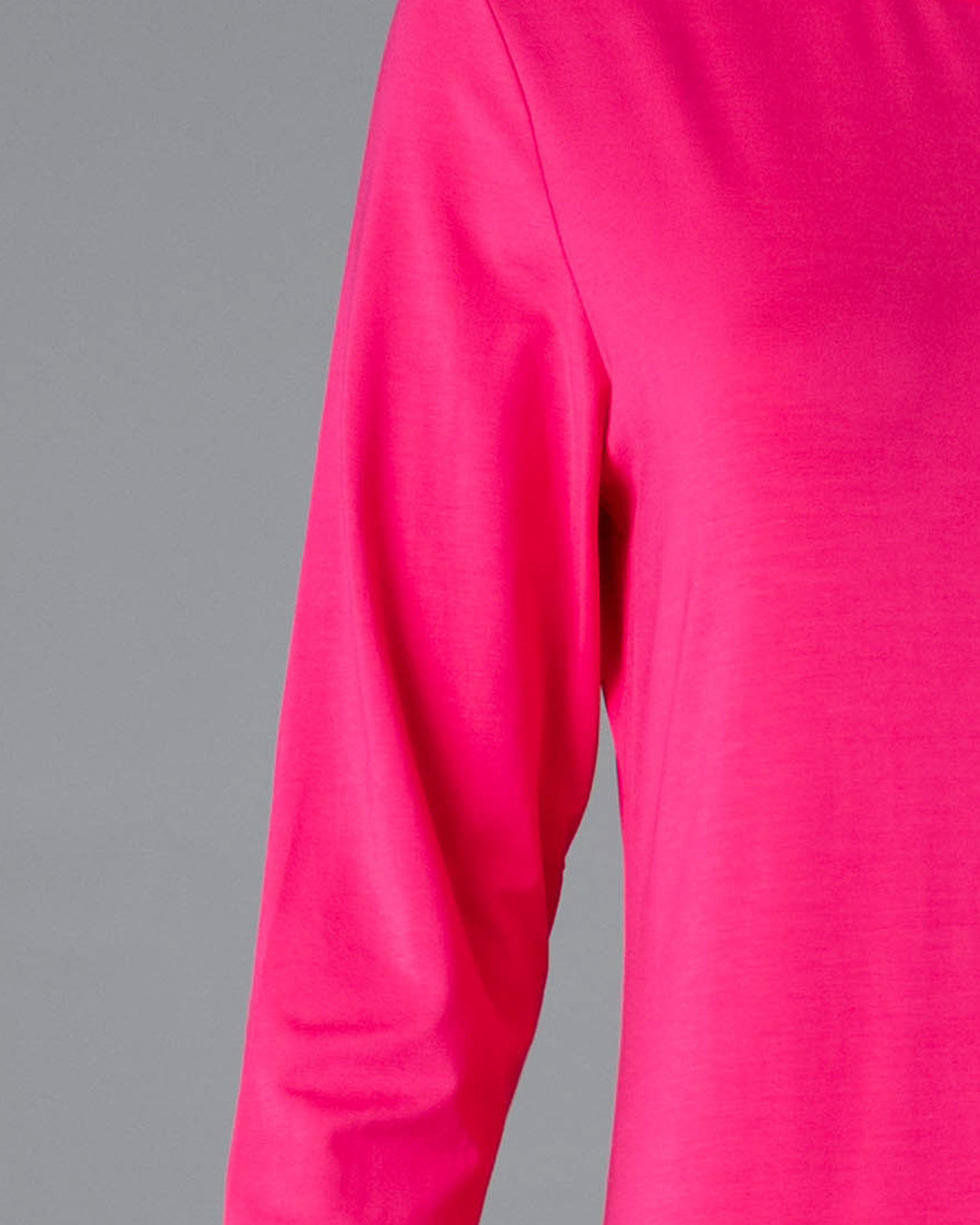 Model wearing Nuggles® Midi Layering Dress in Hot Pink