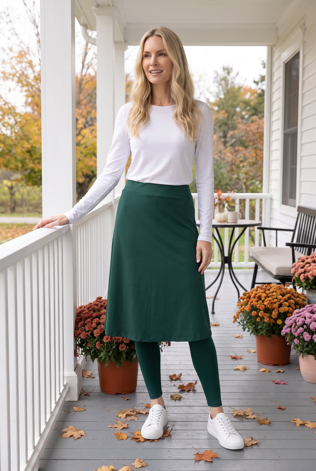 Model wearing Nuggles® Tilly Sport Skirt in Teal Green