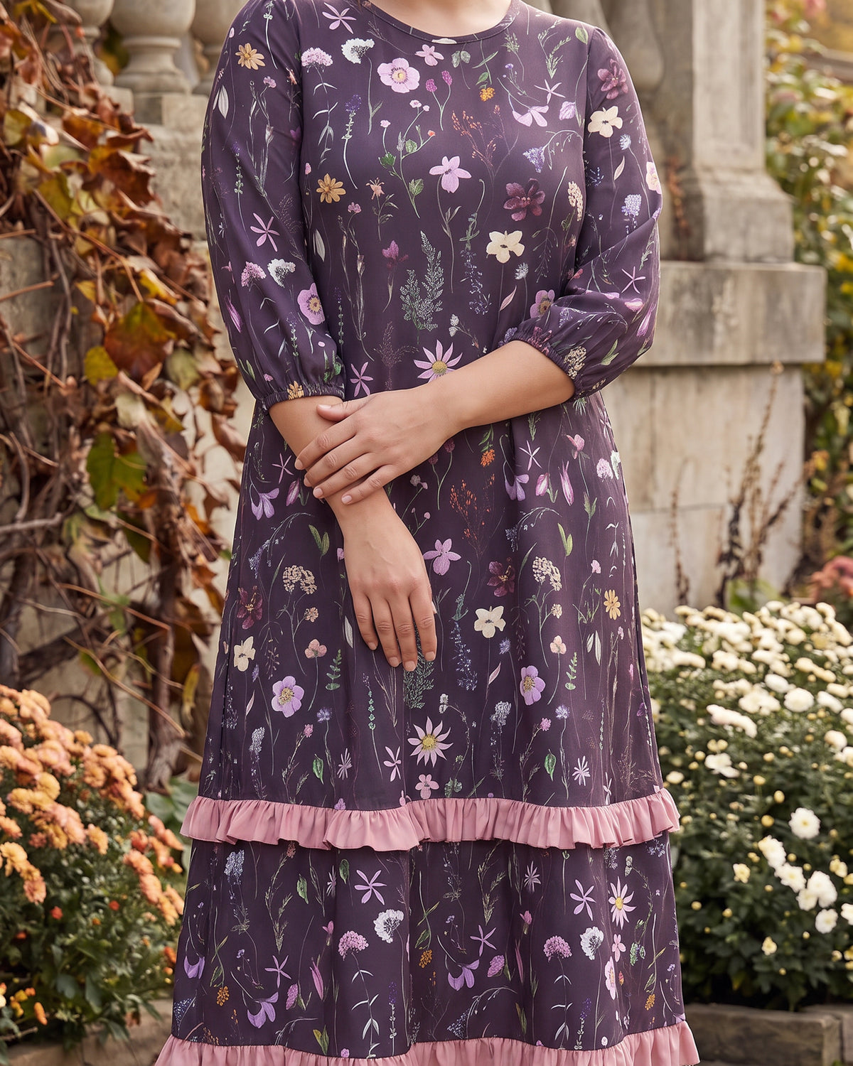 Model wearing Nuggles® Patricia Midi Dress in Twilight Garden