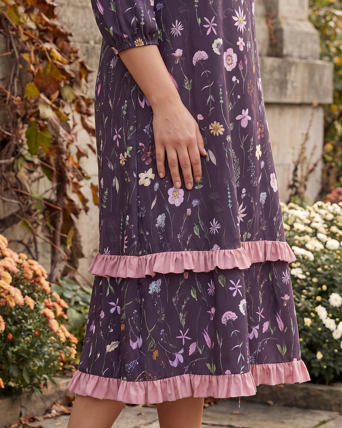 Model wearing Nuggles® Patricia Midi Dress in Twilight Garden