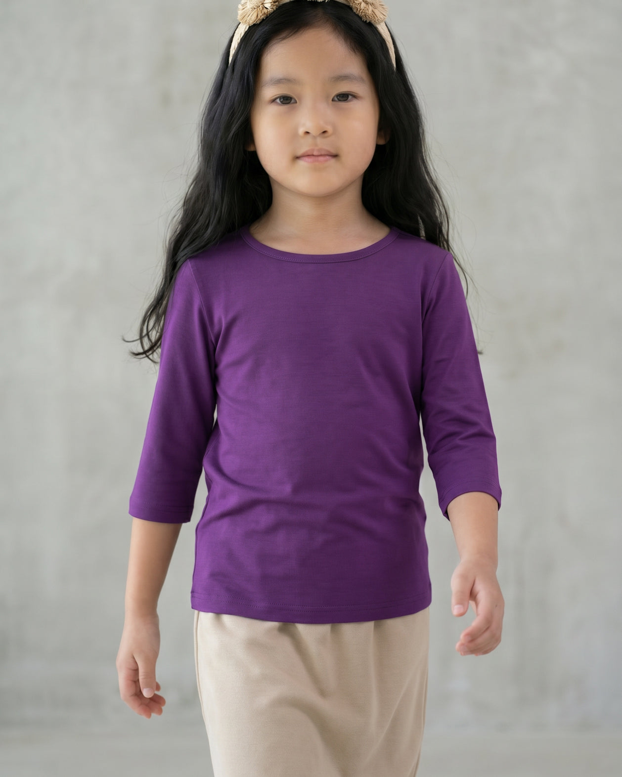 Model wearing the Girls' Nuggles® Essential 3/4 Tee in Violet