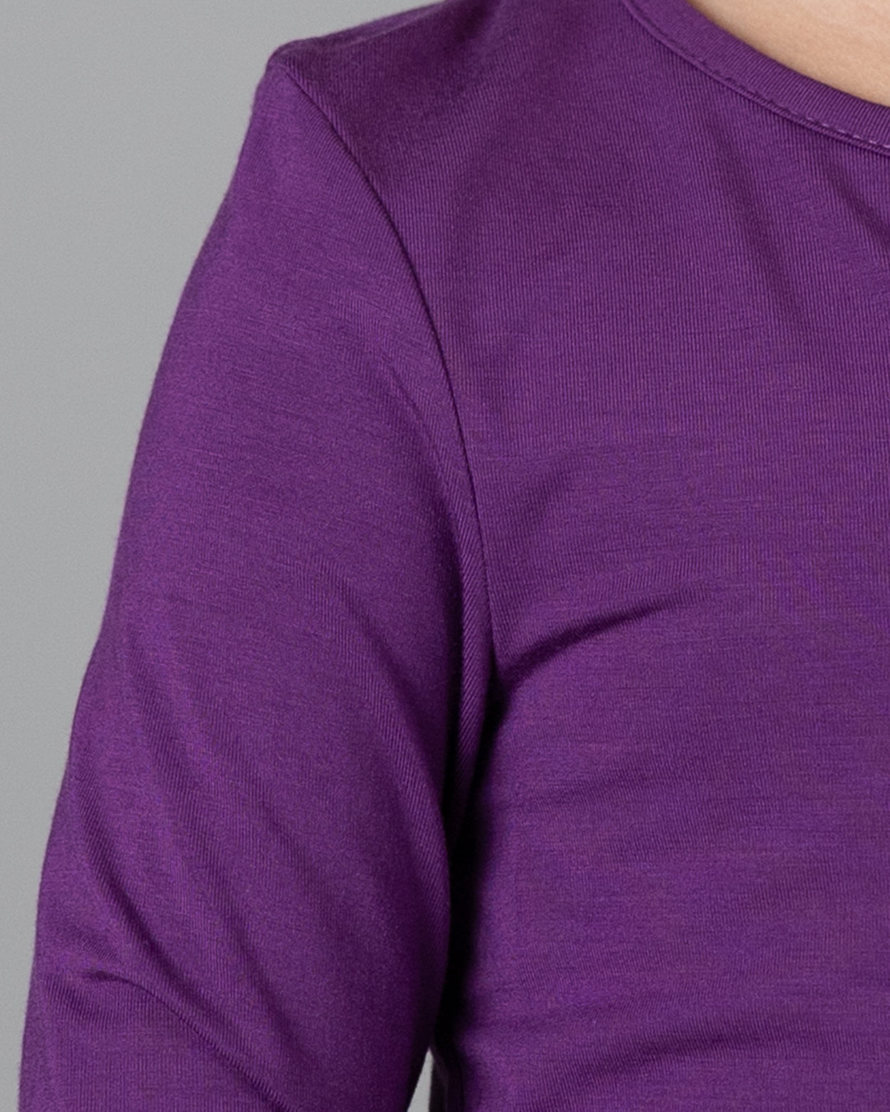Model wearing the Girls' Nuggles® Essential 3/4 Tee in Violet