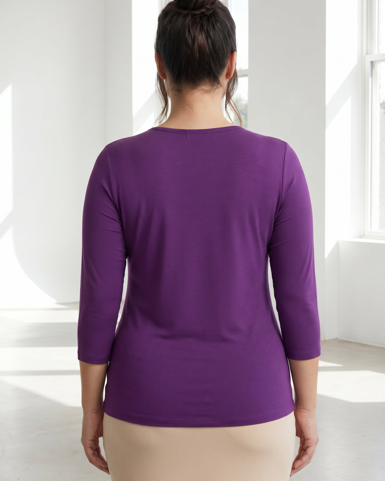 Model wearing Nuggles® 3/4 Essential Tee in Violet