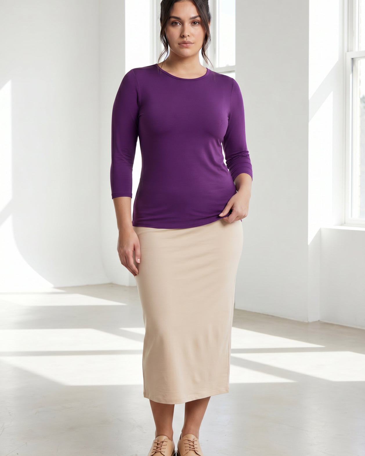 Model wearing Nuggles® 3/4 Essential Tee in Violet