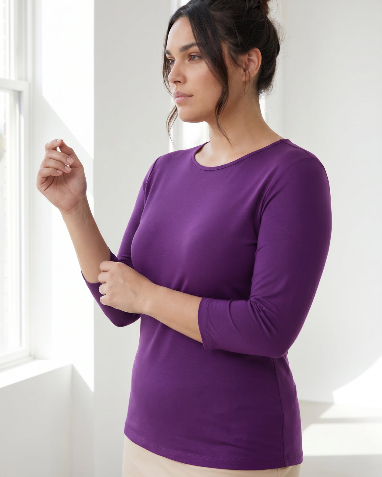 Model wearing Nuggles® 3/4 Essential Tee in Violet