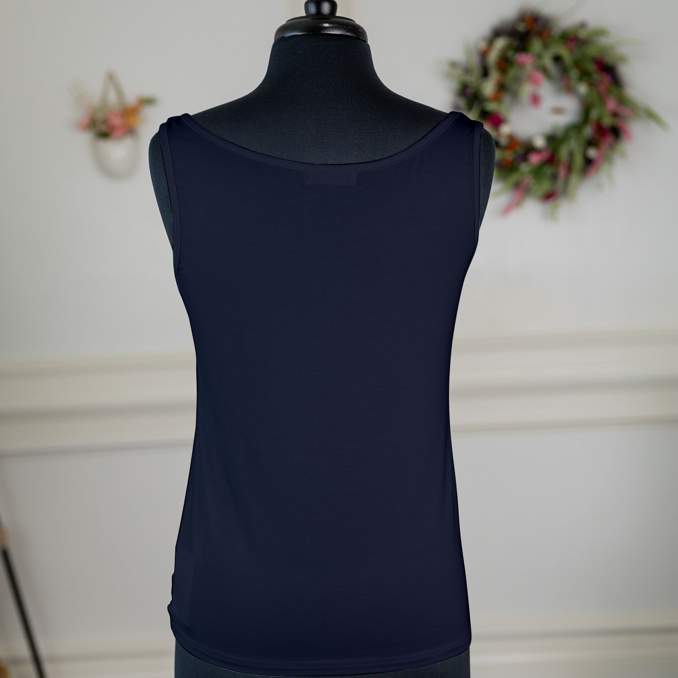 The Nuggles® Essential Tank – a modest, fitted layering tank top with narrow straps and a high neckline, perfect for everyday wear.