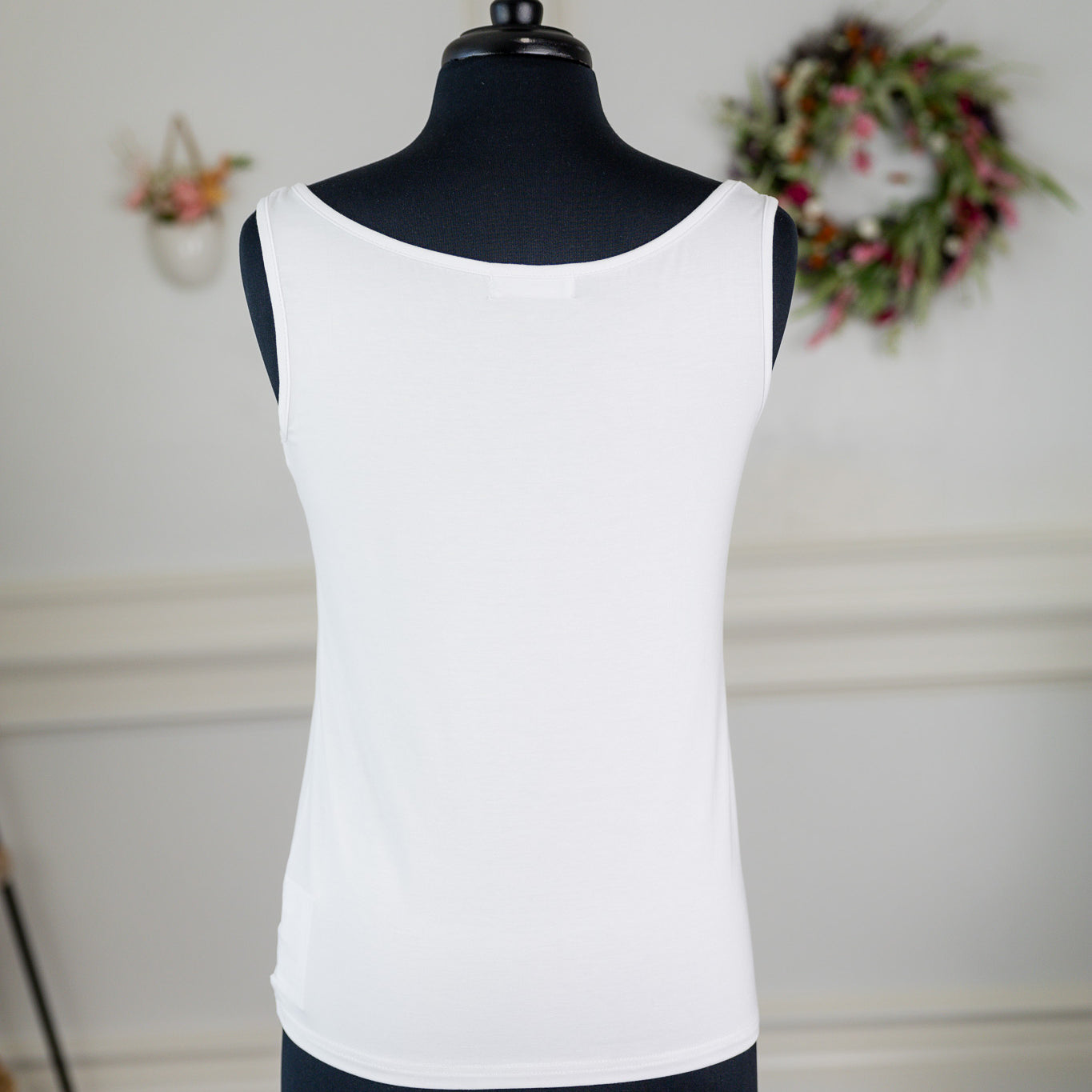 The Nuggles® Essential Tank – a modest, fitted layering tank top with narrow straps and a high neckline, perfect for everyday wear.