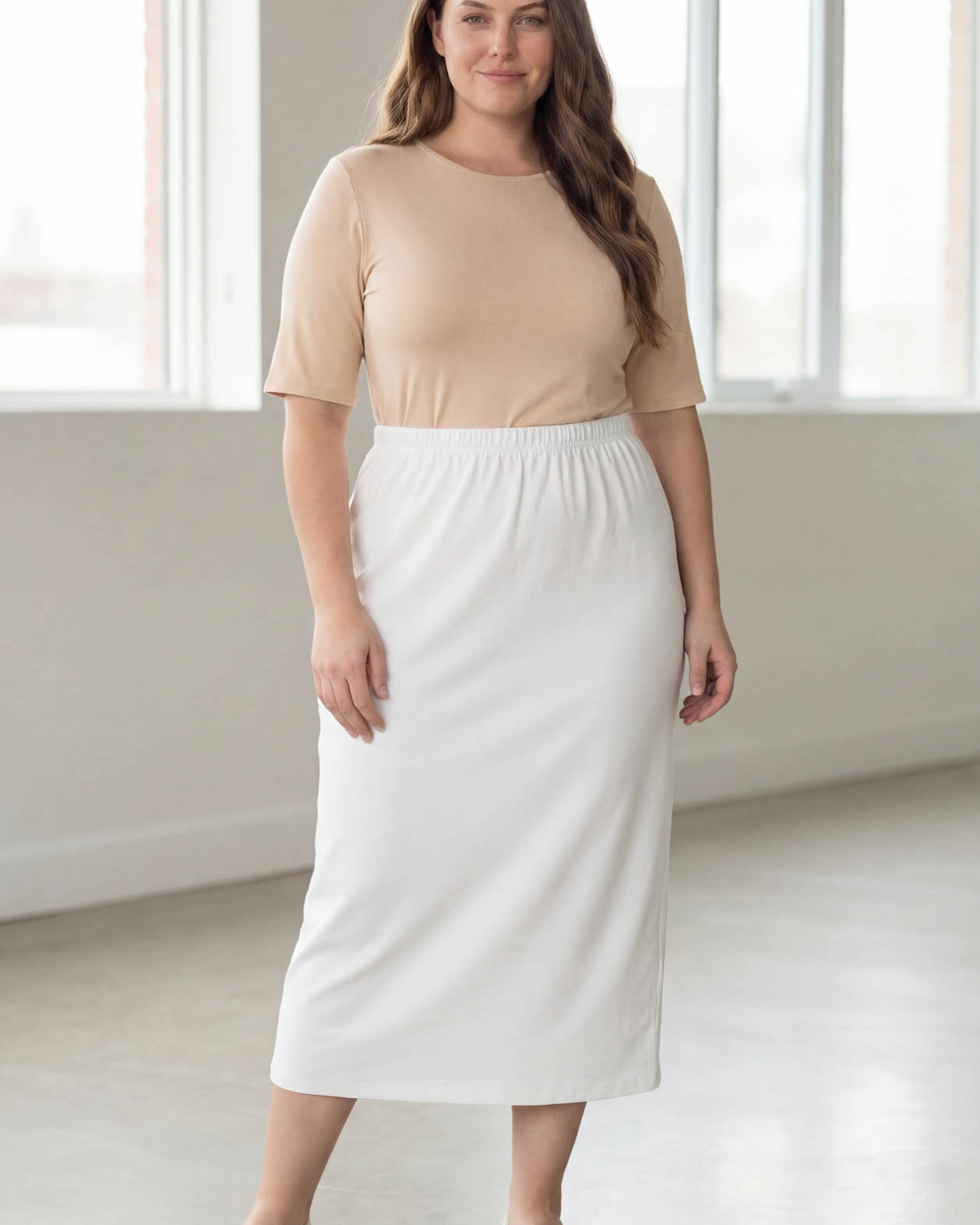 Model wearing Nuggles® 34" Classic Skirt in White